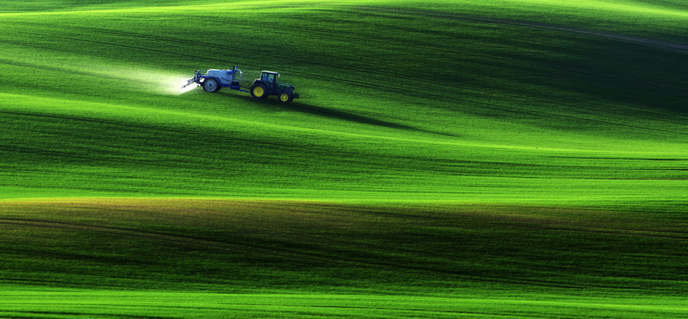 Аренда трактора для выравнивания участка 